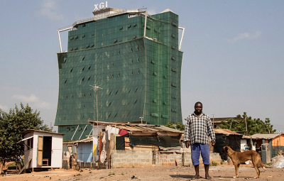 Peter Akmtter is a construction worker on one of the high-rise buildings shooting up in Ghana’s capital, Accra. He and many of the workers live with their families in makeshift houses on or close to the building-sites.
