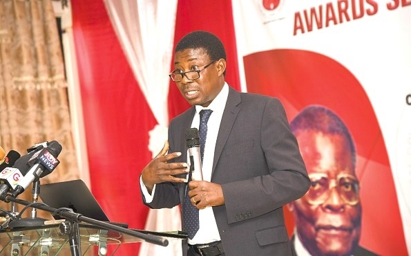 Prof. Justice Bawole (inset), a lecturer at the University of Ghana Business School, delivering the keynote address at the second edition of the Nathan Quao Annual Awards by CLOGSAG. Picture: EBOW HANSON