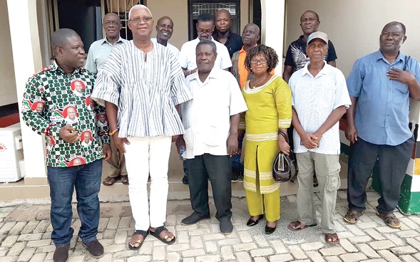 The Chairman of the Cadres, Mr Frank Adoba (3rd left) with Mr Henry Ametefee (2d left), Volta Regional Chairman of the NDC and other members of the party 