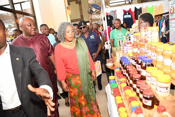  Ms Shirley Ayorkor Botchwey inspecting some local products on exhibition. With her is Mr Carlos Ahenkorah (left). Picture: EBOW HANSON 