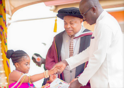 Mr Godfred Yeboah Dame (right), the Deputy Attorney-General, presenting a certificate to Nakeeyat Sam Dramani, with Mr Benedict Nii Tetteh Yartey looking on