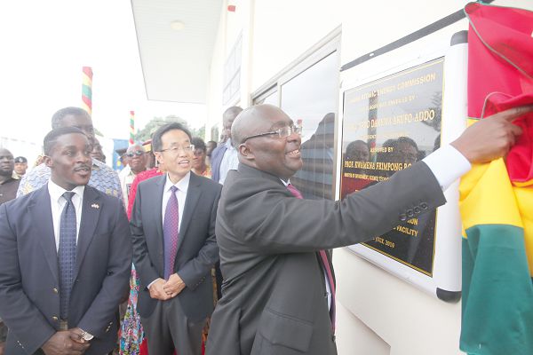 Vice President Dr Mahamudu Bawumia unveiling the plaque to inaugurate the training centre at the Ghana Atomic Energy Commission in Accra. INSET: The front  view of the Radiology and Medical Sciences Research Institute at GAEC. Picture: SAMUEL TEI ADANO