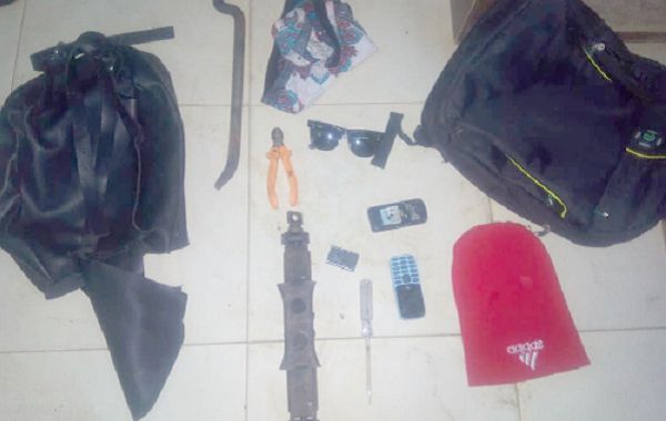 The red Toyota Corolla. inset: Some of the items retrieved by the police 