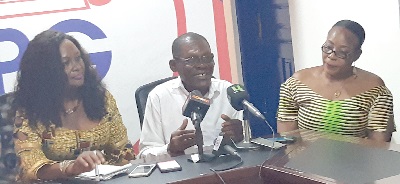 Mr John Amekah (middle) addressing the media.  With him are Mrs Margaret Sarfo (left) and Ms Sophia Akpaloo, National Women’s Organiser of LPG