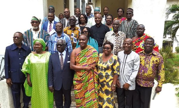 Mr Yaw Osafo-Maafo (3rd left) with the Chairman of the Council of State, Nana Otuo Siriboe II (middle), and other members of the council after the meeting