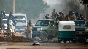 Security forces, seen here on Monday, moved against protesters after a long stand-off