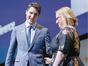 Prime Minister Justin Trudeau (left) interacts with Katja Iversen, President/CEO of Women Deliver, after one of the plenary sessions at the Women Deliver conference 