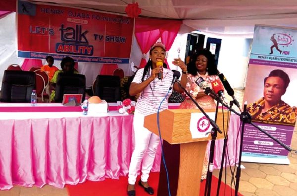 Ms Otiko Afisa Djaba (left), making a presentation at the programme. With her is Dr Beatrice Wiafe Addai 