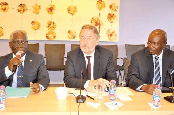 Mr Yaw Osafo-Maafo, the Senior Minister addressing the stakeholders during the consultative meeting in Accra. With him are Mr Christoph Retzlaff (middle), the Chairman of the Development Partners Group of the World Bank, and Mr Henry Rupiny Kerali, the World Bank Country Director 