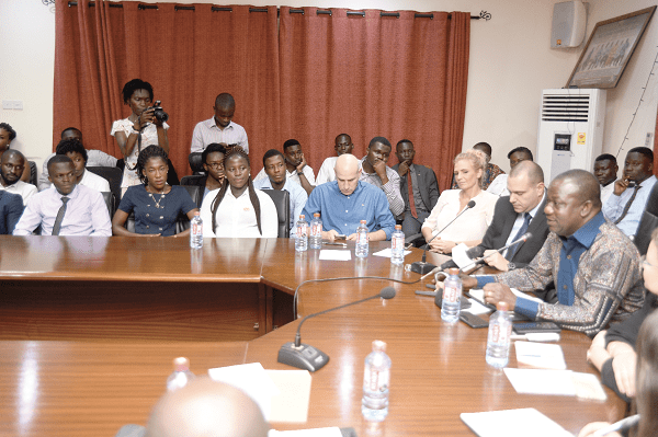 Mr George Oduro (right), a Deputy Minister of Food and Agriculture in charge of Tree Crops, addressing the students in Accra. On his right is Mr Yaron Tamir
