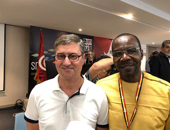 Newly elected IFJ President, Younes Mjahed (left) in a pose with GJA President, Affail Monney (right) at the 2019 IFJ Congress in Tunis
