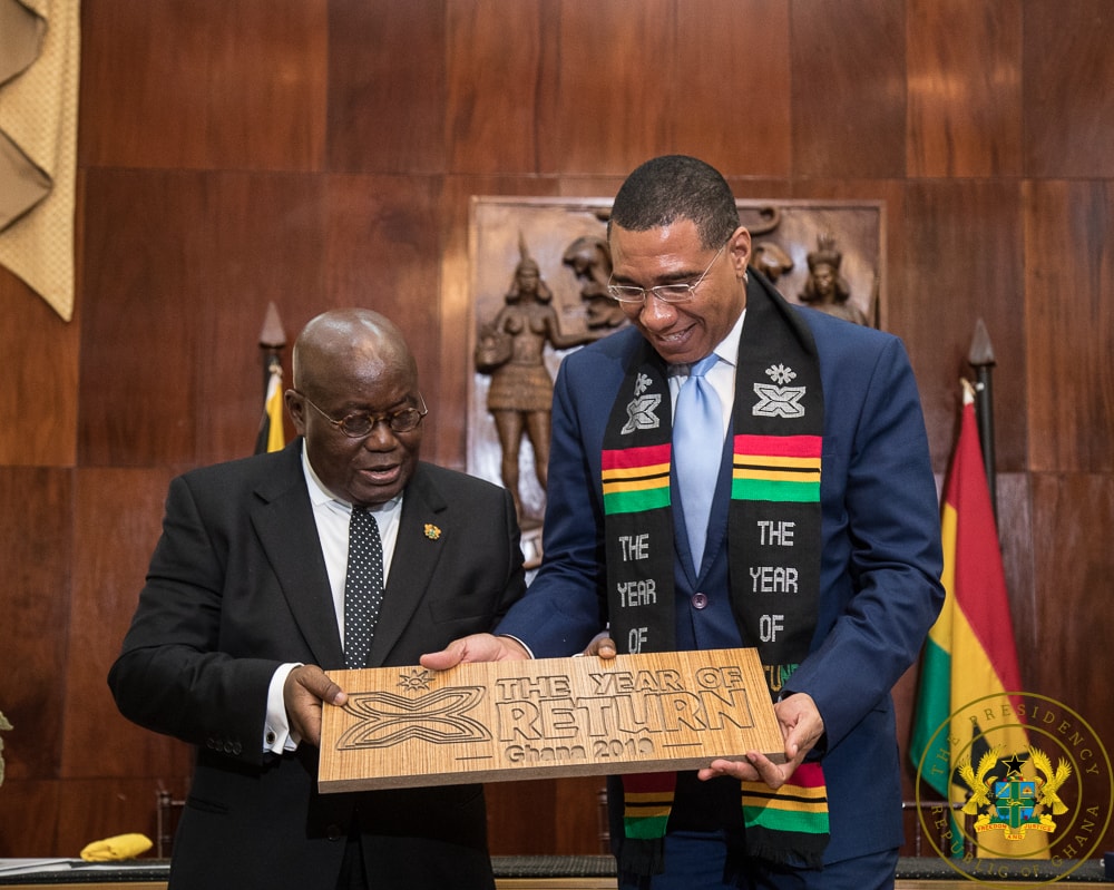 President Akufo-Addo interacting with Prime Minister Andrew Holness.jpg