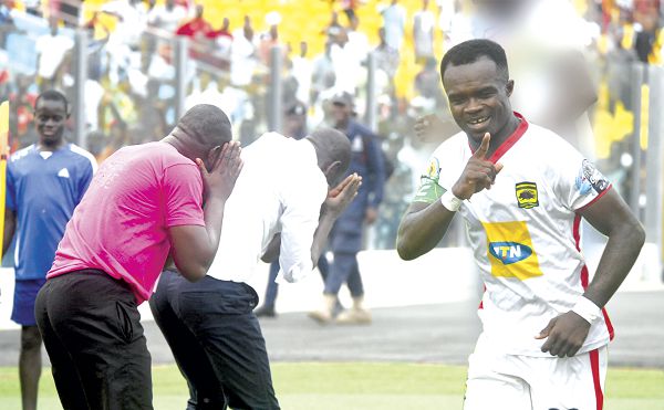 Coach C.K. Akonnor’s (middle) gesture after captain Amos Frimpong (right) converts the penalty captures the mood in Kotoko’s camp. Picture: Ebow Hanson