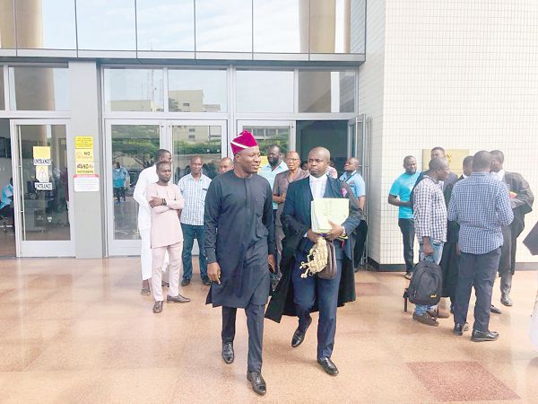 Mahama Ayariga  with Godwin Tamakloe (right), one of his lawyers, leaving the court premises. Picture: EMMANUEL EBO HAWKSON 