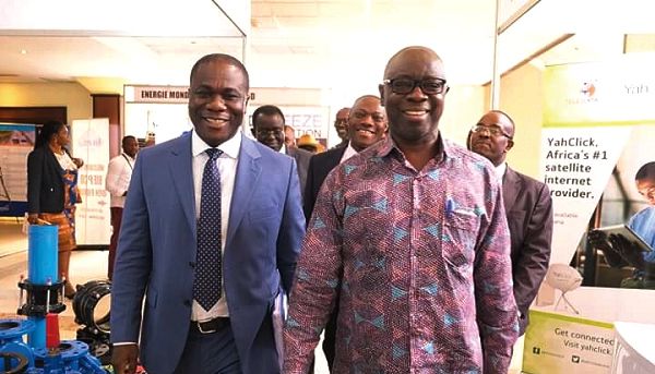 Mr Kwaku Asomah-Cheremeh (right), the Minister of Lands and Natural Resources, in the company of Mr Eric Asubonteng, the President of the Ghana Chamber of Mines, arriving at the event