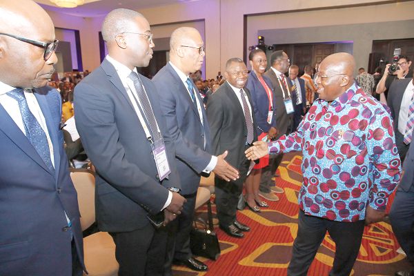 President Nana Addo Dankwa Akufo-Addo exchanging pleasantries with some dignitaries after the opening session of the African Regional Conference. Picture: SAMUEL TEI ADANO