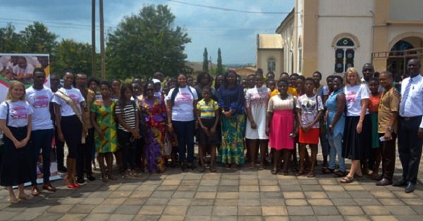  Mrs Justina Marigold Assan (arrowed) and Madam Ernestina Appiah (7th left), some guests and some of the beneficiary girls