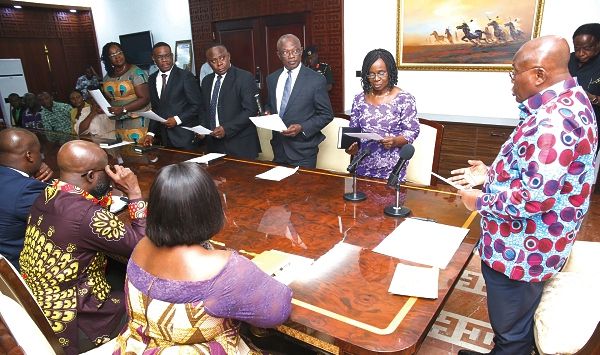 President Nana Addo Dankwa Akufo-Addo swearing in members of the emoluments committee at the Jubilee House. Picture: SAMUEL TEI ADANO