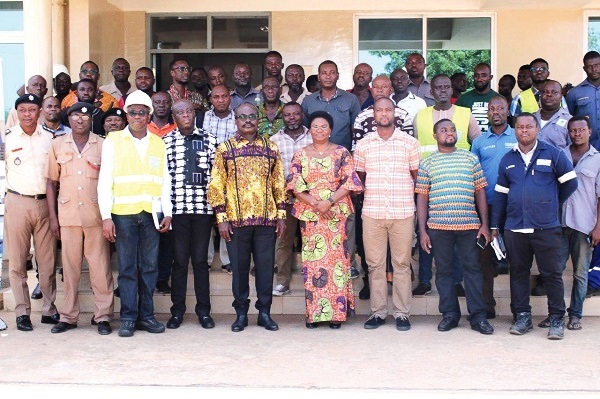 Ms Esther Anku (4th right), Director of Inspection at the NPA and Mr Addo Twum (5th left) with some participants in the safety clinic. With them are Mr Bartholomew Darko (3rd left) and Mr Kingsley Sarpong (4th left), both of the Chase Group. Picture DELLA RUSSEL OCLOO