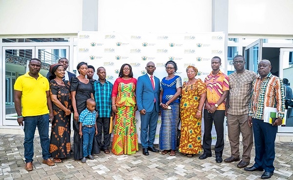 Prof. Opoku-Amankwa (arrowed) with Mrs Wyns-Dogbe (5th left), and some of the beneficiaries and staff of the GES