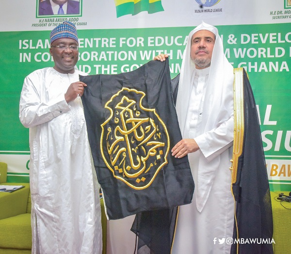 Dr Mohammed Alissa (right) presenting a ‘Kiswah’ to Vice-President Dr Mahamudu Bawumia