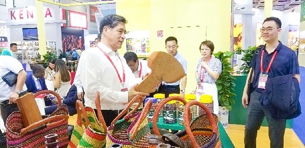 Some participants making enquiries about the products from Ghana