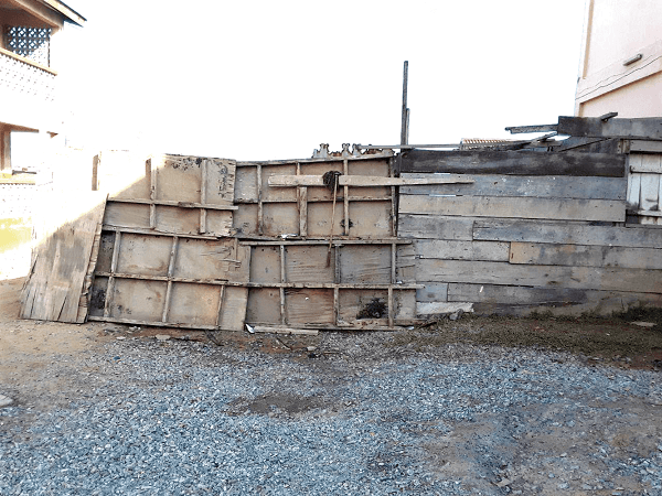 The wooden structure erected to cordon off the underground water reservoir