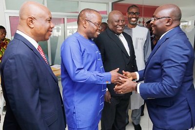 Vice President Dr Mahamudu Bawumia (right) being welcomed by  Mr Daniel Domelevo (2nd left) to the lecture. With them are Justice Jones Dotse (left) and Mr Martin Amidu (2nd right), Special Prosecutor.