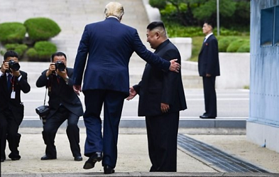 US-North Korea: Trump and Kim agree to restart talks in historic meeting