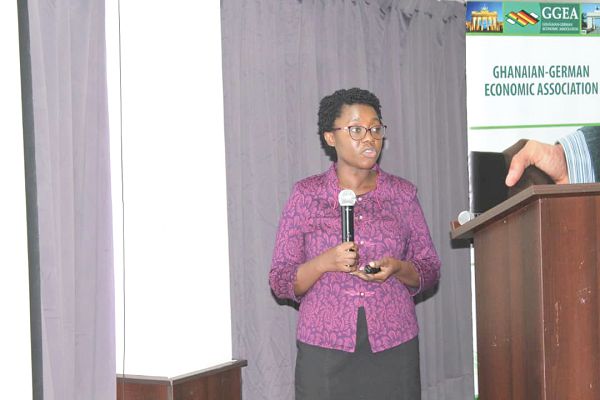 Mrs Evelyn A. E. Nyarko (inset), Deputy Director  of Investor Services Division, GIPC, addressing participants in the forum.  Picture: PATRICK DICKSON  