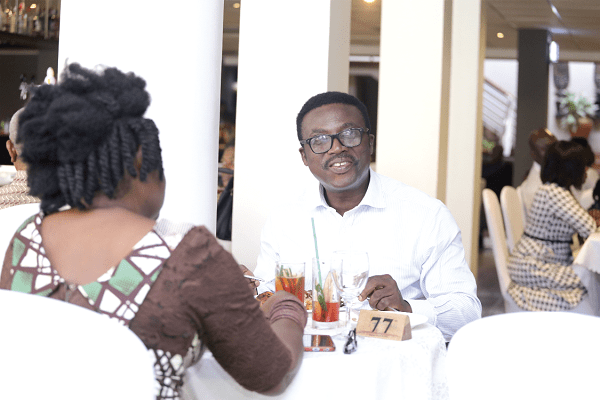 Some customers having a meal at the luncheon Some customers having a meal at the luncheon