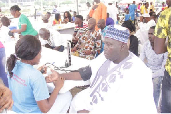 Some participants going through the health screening exercise after the Eid-ul-Fitr prayers at the Black Star Square in Accra. Picture: EDNA ADU-SERWAA
