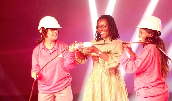  Mrs Ursula Owusu Ekuful (middle), Minister Communication being assisted by Madam Yolanda Cuba (right) to launch the Vodafone 4G network. Picture: NII MARTEY M. BOTCHWAY