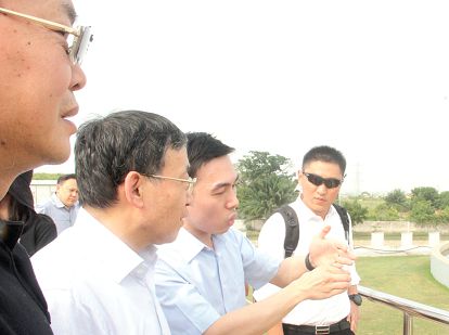  Mr Chen Jing (3rd left), former Managing Director, China Gezhouba  Company (CGGC) Ghana, explaining a point to Mr Yu Xuejun (2nd left), Chairman of the Board of Supervisors of the Exim Bank of China, and Mr Sun Ping (left), Vice President of Exim Bank of China, during a tour of the China Gezhouba Plant at Kpong. Picture: Maxwell Ocloo