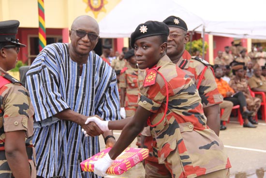 Mr Ambrose Dery (left), the Minister for the Interior, presenting the Overall Best Recruit award to RFW Veronica Ababio Aggrey at the event. Picture: EDNA ADU-SERWAA