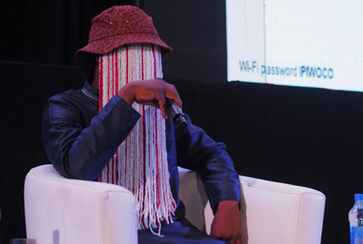 Undercover journalist Anas Aremeyaw Anas speaks at IPI's 2018 World Congress in Abuja, Nigeria. Photo: Alma Onali/IPI