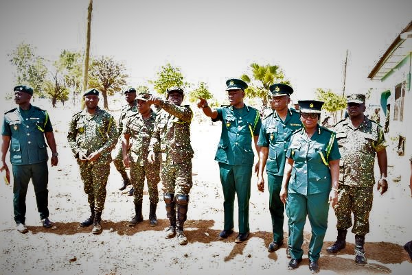 Mr Kwame Asuah Takyi (4th right)  being conducted round the facilities of some  border posts