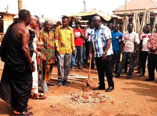 Mr Ekow Quansah Hayford interacting with some leaders of the community, including the Omanhen of Mankessim, Osagyefo Amanfo Edu (2nd left) after the sod cutting 