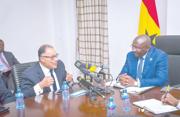  Dr Mahamudu Bawumia having a discussion with Dr Hafiz Ghanem (left), World Bank Vice-President for Africa 
