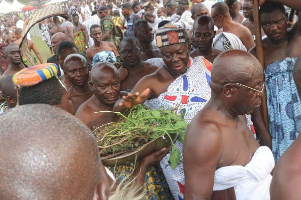 Asantehene, Otumfuo Osei Tutu II, placing his hands on leaves before he sat in state to receive visitors. Pictures: EMMANUEL BAAH