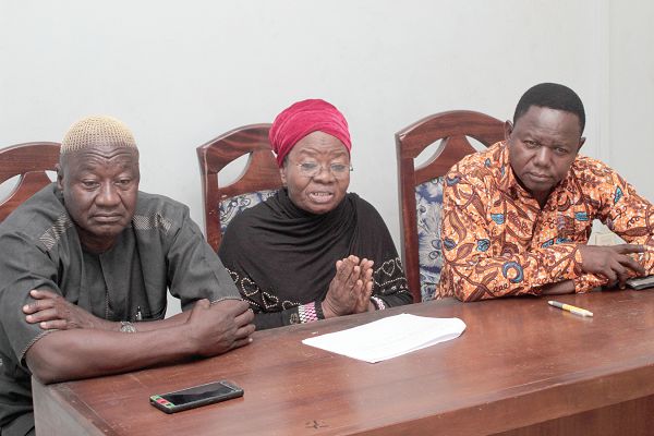Mrs Victoria Adongo (middle), Executive Director of Peasant Farmers Association of Ghana addressing the media at the event. Those with him are Mr Abdul Rahman Mohammed (left), National President of the Peasant Farmers Association of Ghana and Edward Karewa, General Secretary of the General Agriculture Workers Union (GAWU). Picture: GABRIEL AHIABOR