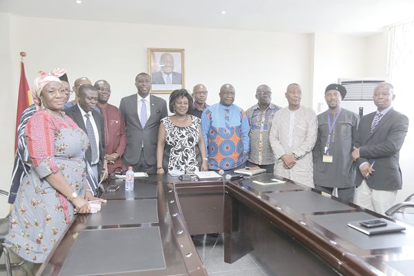 Ms Cecilia Abena Dapaah (5th left), the Minister of  Sanitation and Water Resources and her deputies with members  of the Parliamentary Select Committee on Works and Housing, Sanitation and Water, during the visit. EMMANUEL ASAMOAH ADDAI