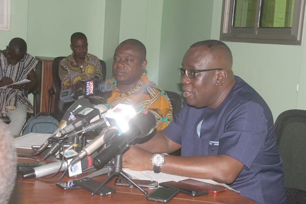 Mr Kwadwo Owusu-Afriyie briefing journalists at the conference. To his right is Mr John Allotey. Picture: Maxwell Ocloo