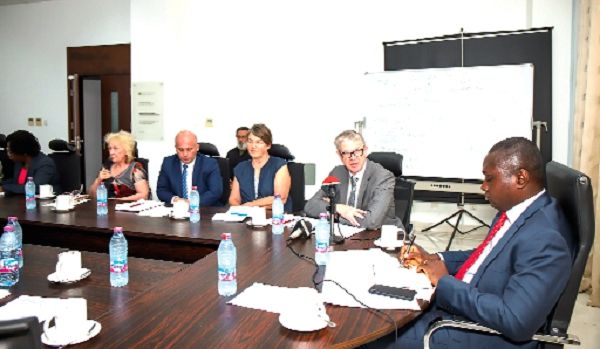  Mr Malcolm Evans (2nd right) briefing Mr Charles Owiredu (right) on the National Preventive Mechanism at the Ministry of Foreign Affairs and Regional Integration in Accra