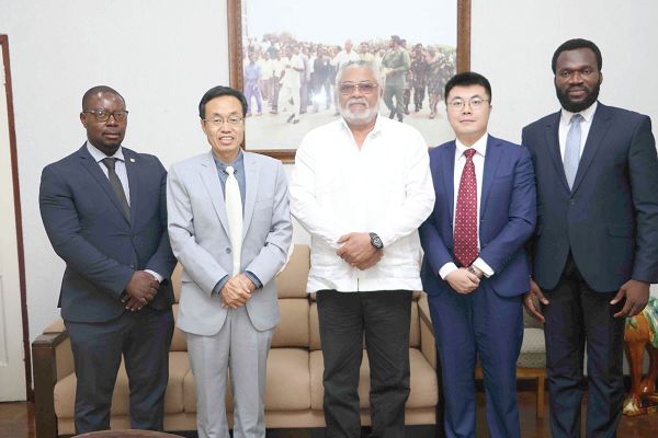 Former President Rawlings (middle) with the Chinese delegation