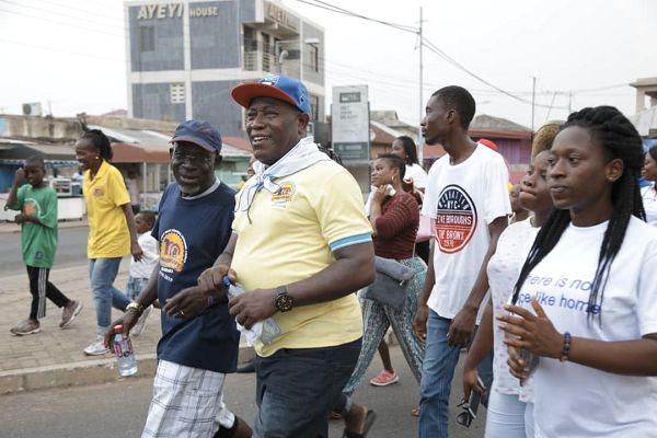 Rev. Samuel K. Quartey, Superintendent Minister of the EBMMC, leading some of his congregants in a walk as part of activities commemorating the centenary anniversary