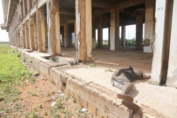 A mentally sick person taking a rest at the defunct Meridian Hotel at Community 1 in Tema. Picture: SAMUEL TEI ADANO