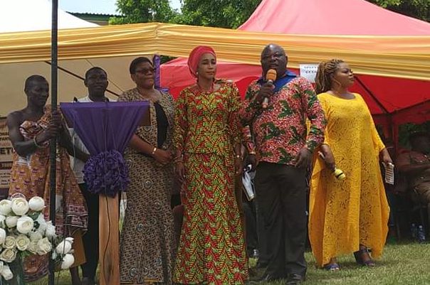 Mr Thomas Adjei Baffoe, Deputy Central Regional Minister, speaking at the launch. With him include Ms Barbara Asher Ayisi (middle) and Mrs Roberta Dawson Amoah (3rd left) from the Ghana Tourism Authority