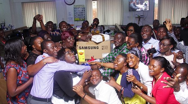 Mr Nehemiah Owusu Achiaw (arrowed), being mobbed by the Graphic reporters during the farewell party. Picture: NII MARTEY M. BOTCHWAY