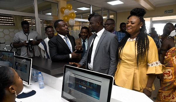 Mr Richard Nii Armah Quaye (3rd left) conducting some of the guests round his office